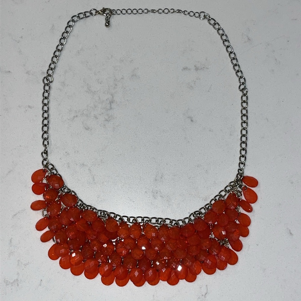 J. Crew orange shell necklace.